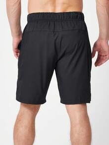 Pantalones cortos de entrenamiento tejidos de 9" de tela elástica para hombres de la marca Nike, de ajuste regular, para baloncesto, fútbol, gimnasio, entrenamiento y correr - Negro - Ver 2