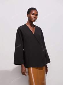 Chaqueta tipo kimono con doble solapa y cinturón en talla grande
