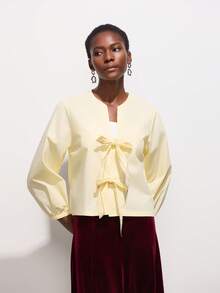 Camisa de mujer de color amarillo mantequilla con decoración de lazo - Amarillo - Ver 1