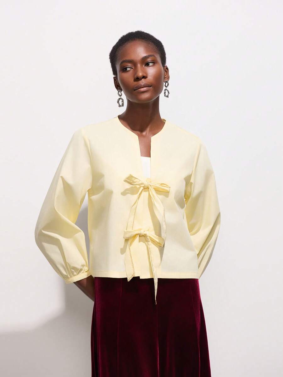 Camisa de mujer de color amarillo mantequilla con decoración de lazo - Amarillo - Ver 1