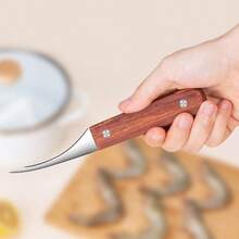 1件不锈钢虾壳去壳工具 - 易于清洁的海鲜处理工具，可有效去除虾壳和内脏，是家庭烹饪和露营的必备工具。