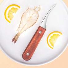 1件不锈钢虾壳去壳工具 - 易于清洁的海鲜处理工具，可有效去除虾壳和内脏，是家庭烹饪和露营的必备工具。