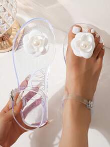 Sandalias de gelatina estilo INS 2025 para mujeres, antideslizantes y suaves de PVC para la playa, chanclas transparentes de gelatina planas para vacaciones, blancas, con diseño original de pequeña multitud, sandalias planas