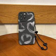 Set de 2 fundas: teléfono + pulsera negra con cordón de TPU anticaídas. Funda con estampado de corazón en tinta gris. Compatible con S22/223/S24/S25 Ultra/S25 Edge, 16/15/14/13/12 Pro y 16 Plus. - Negro - Ver 4