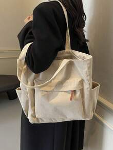 Modna, jednokolorowa torba typu tote z wieloma kieszeniami dla kobiet, duża pojemność, swobodna torba na ramię na wakacje na świeżym powietrzu, lekka i uniwersalna torba na zakupy, prosta, codzienna torba typu crossbody do dojazdów do pracy i szkoły - Beżowy - Zobacz 4
