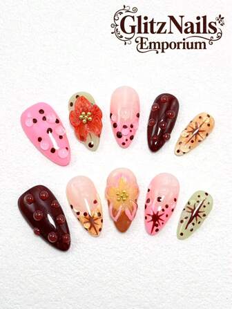 10片纯手工可穿戴指甲，25毫米杏仁形指甲片，按压式指甲，可反复拆卸佩戴，手绘工艺，手工雕刻，金色钢球点缀，适合春夏季佩戴，适合女士和女孩佩戴，适合派对、婚礼和日常佩戴。每套10片装，三种尺寸可选。套装内含指甲，是馈赠亲友的理想礼物。美甲用品