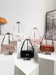 时尚新款蝴蝶结装饰单肩包，街头风格休闲通勤斜挎包，简约纯色腋下包，女士