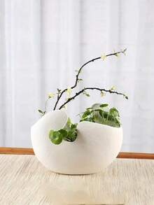 1个北欧风格装饰蛋壳花盆，哑光白色纹理表面，独特的镂空设计。非常适合摆放多肉植物/干花，并为家庭办公室增添装饰元素。也可用于收纳化妆品和化妆刷。 - 彩色 - 查看 6