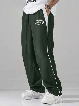 1 قطعة بنطلون رياضي فضفاض للرجال بخصر رباط، لون أحادي كاجوال، بنطلون طويل للربيع/الصيف، مناسب كهدية للصديق، خفيف الوزن، قابل للتنفس، بنطلون رياضي سريع الجفاف