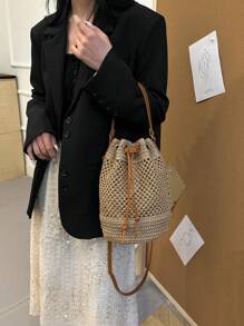 Bolso de playa tipo cubo de estilo boho con cordón, bolso de mano tejido de paja, diseño de nicho de moda, bolso de cubo cruzado versátil para la playa, nuevo modelo 2025