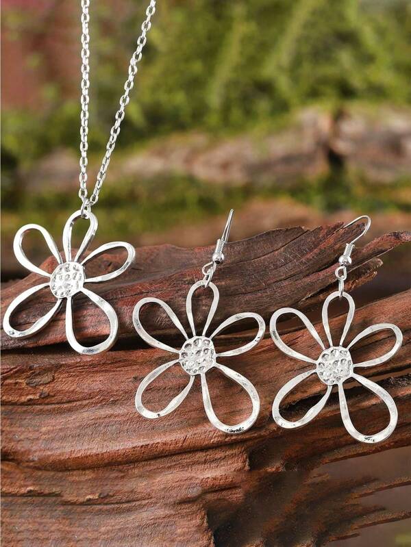 Conjunto de joyería bohemia vintage elegante con collar colgante de flor y pendientes. Diseño grande y hueco de girasol floral sin plateado ni mosaico, accesorio versátil para uso diario y como regalo para mujeres