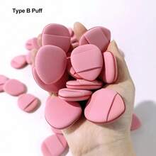 两件套迷你指套粉扑,配一个收纳盒。便携式粉色迷你指套海绵,可用于涂抹膏状遮瑕膏,是旅行、化妆、家居装饰、梳妆台、卧室、化妆配件、粉扑、美妆蛋、散粉扑、化妆海绵的理想之选。价格实惠,适合作为圣诞礼物、送给女性的礼物或圣诞礼物。 - 彩色 - 查看 4