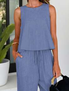 女士夏季亚麻两件套西装，无袖上衣和带口袋的松紧腰裤，时尚休闲套装适合休闲旅行和日常通勤 - 藏蓝色 - 查看 7