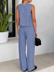 女士夏季亚麻两件套西装，无袖上衣和带口袋的松紧腰裤，时尚休闲套装适合休闲旅行和日常通勤 - 藏蓝色 - 查看 4