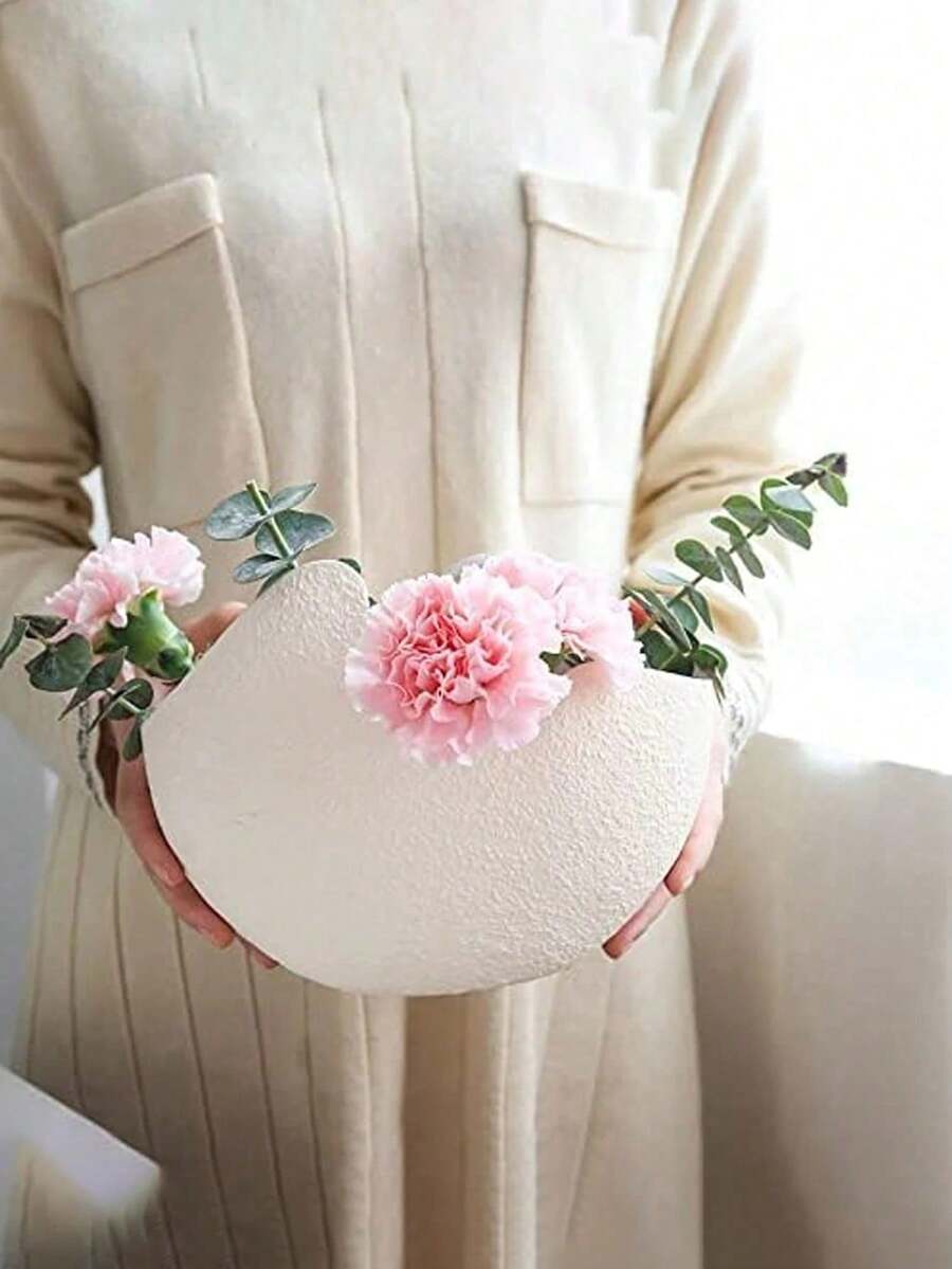 1个北欧风格装饰蛋壳花盆，哑光白色纹理表面，独特的镂空设计。非常适合摆放多肉植物/干花，并为家庭办公室增添装饰元素。也可用于收纳化妆品和化妆刷。 - 彩色 - 查看 1