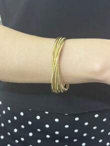 3 种尺寸可供选择：30 件/套、50 件/套、77 件/套哑光金色线圈手镯，专为女性设计，适合派对、节日、珠宝配饰（注意：主图中显示的是 50 件套装，77 件套装的佩戴效果更好，30 件套装的佩戴效果略有不同，并且产品颜色在不同光照条件下可能会略有不同，适合不同手腕尺寸。）