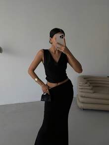 黑色时尚女士度假纯色性感摆领短款背心和荷叶边腰带美人鱼裙套装