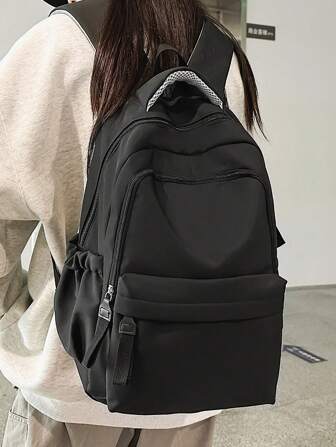 1 件简约大容量纯色多隔层背包，适合旅行、观光、度假
