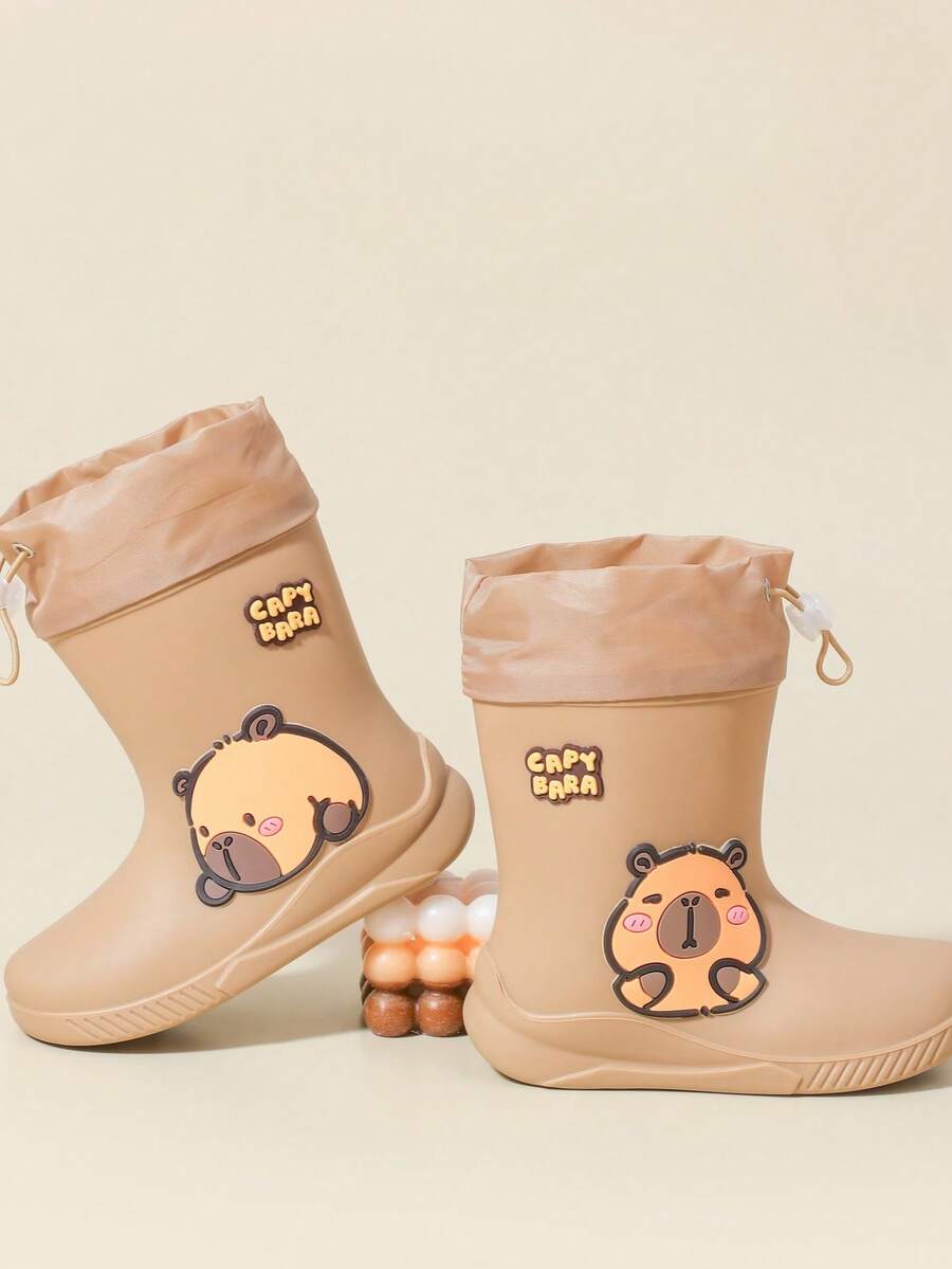 TEEOEC 2025新款儿童中筒雨靴，加厚保暖耐用防水卡通图案高端橡胶雨鞋，适合男童女童，小学生，可爱封闭式防水中筒雨靴 - 卡其色 - 查看 1