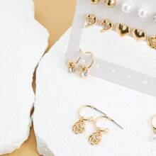 1 Set de 9 pares de pendientes de tono dorado de moda para mujeres, material de circonita con pendiente de acero inoxidable Posts, hipoalergénico, adecuado para uso diario y vacaciones, Set diseñado específicamente para hembras