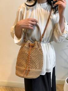Bolso de playa tipo cubo de estilo boho con cordón, bolso de mano tejido de paja, diseño de nicho de moda, bolso de cubo cruzado versátil para la playa, nuevo modelo 2025