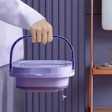 A Small, Portable, Foldable Washing Machine Is Suitable For Travel In A Car Or For Storing In A Dormitory. It Does Not Take Up Space And Can Be Placed In A Small Space. A Small Washing Machine For Washing Underwear And Socks Alone, A Small Household Appliance That Is Easy To Carry
