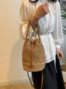 Bolso de playa tipo cubo de estilo boho con cordón, bolso de mano tejido de paja, diseño de nicho de moda, bolso de cubo cruzado versátil para la playa, nuevo modelo 2025
