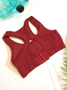 1 szt. damski czerwony, oddychający biustonosz sportowy typu racerback z wyjmowanymi wkładkami, bez fiszbin i wygodny