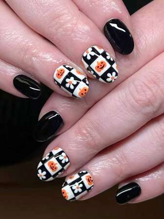 24 pièces d'ongles ovales pressés pour le manucure DIY. Couleur noire lumineuse. Petites fleurs blanches. Motif de citrouille pour faux ongles. Faux ongles ovales brillants. Faux ongles acryliques couvrants.