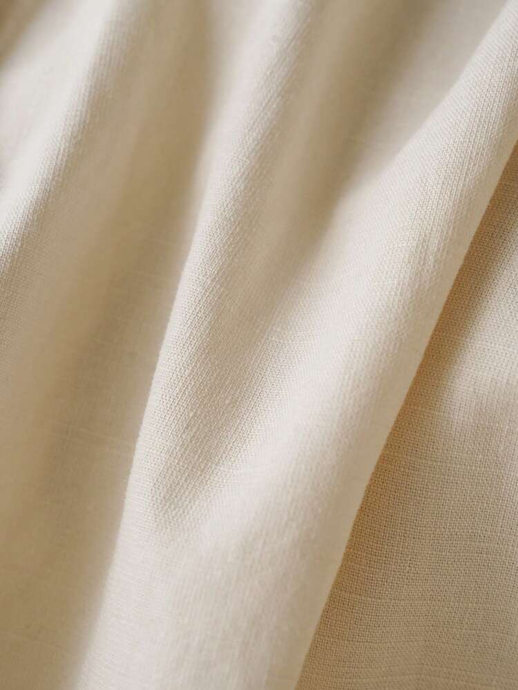 Naisten yksivärinen pellavapaita kaikkiin vuodenaikoihin - kevät, kesä, syksy ja talvi, pitkähihainen, väljä istuvuus, lasketut olkapäät kauluksella ja taskulla. Monipuolinen minimalistinen malli muodikkaaseen rentoon arkeen, eleganttiin työmatkalle tai lomalle. - Aprikoosi - Näytä 10