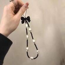 1 pieza Cordón asimétrico para teléfono con perlas falsas, colgante para estuche de teléfono móvil o cámara digital, estilo veraniego