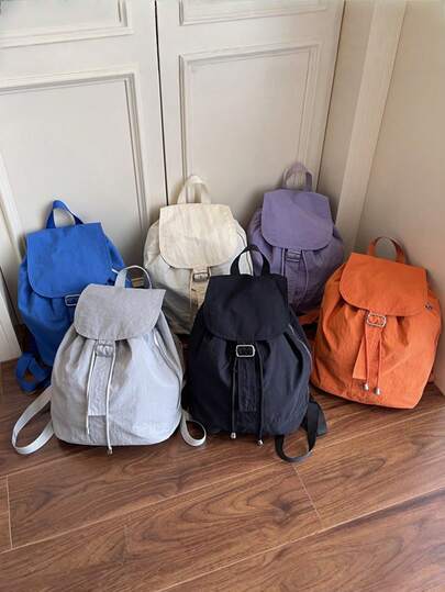 1 款时尚百搭的新款简约纯色背包，春夏新款，适合返校季。尼龙材质抽绳扣设计更轻便，大容量可折叠包非常适合青少年上学、日常出行、购物、旅行度假等。