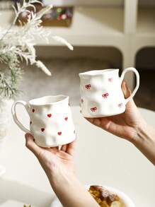 1pc INS Style Large Capacity Ceramic Mug With Bowknot & Heart Design, Handcrafted Asymmetrical Coffee Cup, Suitable For Home Breakfast, Milk, Oatmeal, Garden Afternoon Tea, Latte Art, Juice & Couple Water Cup