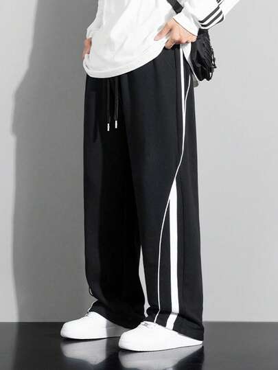 男士休闲运动裤，宽松舒适，适合春秋季节，是馈赠亲朋好友的绝佳礼物