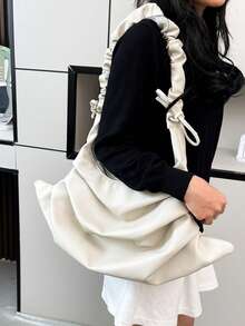 小众设计褶皱单肩包、皮革防水斜挎包、不对称背包