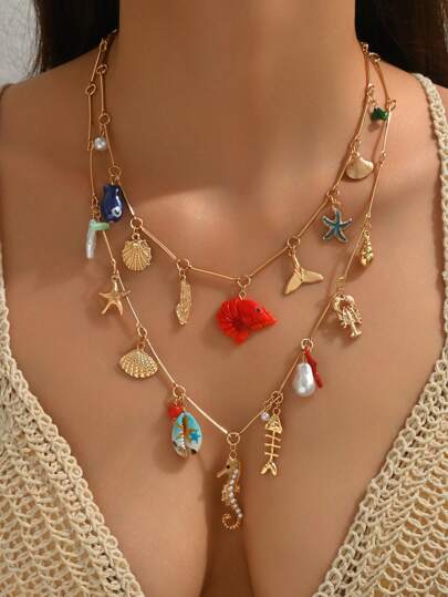 1 pezzo Elegante collana a più fili per l'estate e la spiaggia per donna, colori e design casuali inclusi oro, stella marina, conchiglia, granchio, pesce in ceramica, aragosta in resina, conchiglia, tartaruga, stella marina finta con perle, pesce dorato, adatto per spiaggia, vacanze, eventi