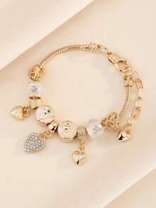 1件极简时尚水钻镂空心形、三叶草、粉色花朵、蜜蜂吊坠手链，适合青少年日常佩戴的时尚饰品