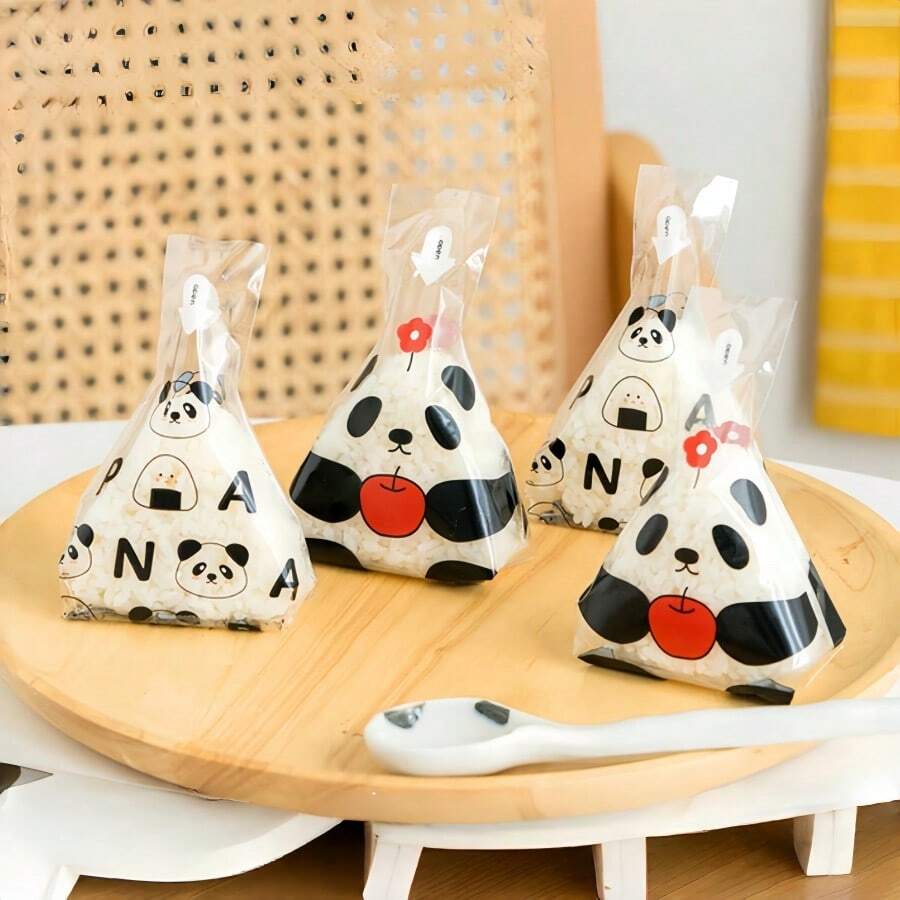 50个三角饭团包装袋 海苔寿司模具包装 烘焙饰品模具卡通包装（包装袋随机发送）