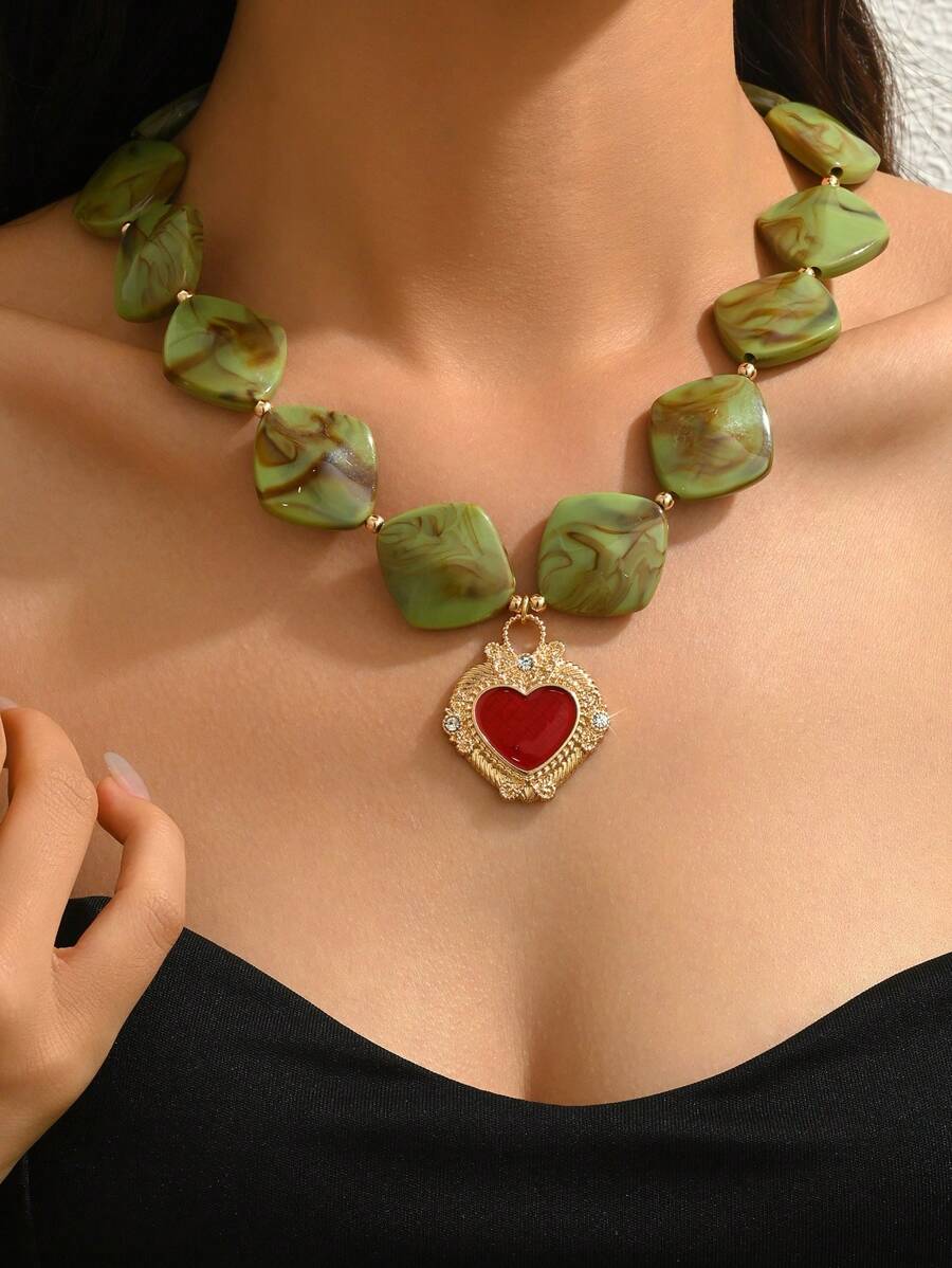 1 pieza Elegante y de moda Personalizado Corazón dorado, Collar de colgante de corazón de resina 3D naranja y rojo con patrón asimétrico Cadena dorada, Múltiples estilos disponibles, Apropiado para uso diario, vacaciones, fiestas con atuendos sexys. Por favor, entienda que habrá una compuerta de inyección de moldeo en la parte inferior de cada colgante de resina.