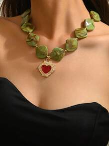 1 pieza Elegante y de moda Personalizado Corazón dorado, Collar de colgante de corazón de resina 3D naranja y rojo con patrón asimétrico Cadena dorada, Múltiples estilos disponibles, Apropiado para uso diario, vacaciones, fiestas con atuendos sexys. Por favor, entienda que habrá una compuerta de inyección de moldeo en la parte inferior de cada colgante de resina.