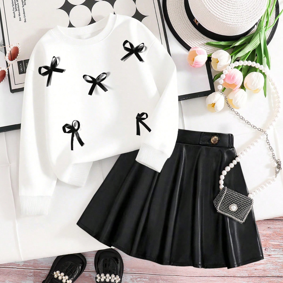Conjunto de blusa de manga larga con cuello redondo y adorno de lazo talla grande falda plisada para niñas preadolescentes