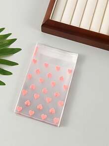 100 个/50 个带有心形图案的自粘塑料袋，耐污，一次性，多用途礼品包装材料 - 非常适合礼物和生日礼物！ - 無色 - 查看 7