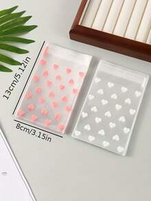 100 个/50 个带有心形图案的自粘塑料袋，耐污，一次性，多用途礼品包装材料 - 非常适合礼物和生日礼物！ - 無色 - 查看 9