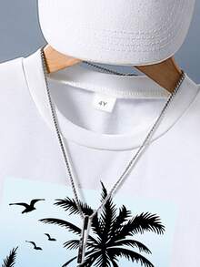 Young Boy Palm Tree Print Short Sleeve T-Shirt And Shorts Set