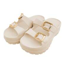 Zapatillas de EVA sin cordones, tacón grueso para más altura. Diseño elegante y cómodo, ideal para días al aire libre.