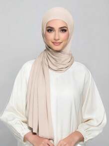 1件速干平纹针织头巾，采用柔软透气、抗起球面料制成。系带式头巾。适合穆斯林全年使用和日常佩戴。