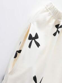 两件套女士睡衣套装，V领长袖上衣和长裤，柔软舒适，适合春秋季和秋冬季穿着。 - 米色 - 查看 9