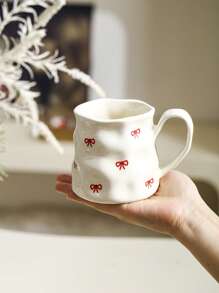 1pc INS Style Large Capacity Ceramic Mug With Bowknot & Heart Design, Handcrafted Asymmetrical Coffee Cup, Suitable For Home Breakfast, Milk, Oatmeal, Garden Afternoon Tea, Latte Art, Juice & Couple Water Cup