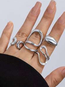 一款独特的不对称镂空造型女士戒指，带有一丝欧美风格，散发着高级时尚和夸张的感觉，非常适合日常佩戴、节日、生日、周年纪念日或街头摄影。 - 金色 - 查看 3