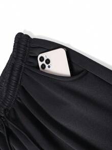 Quần thể thao nam đa năng, phù hợp mọi mùa, có dây rút điều chỉnh, túi bên hông và logo thương hiệu, thích hợp cho phòng tập, chạy bộ, tập luyện và mặc thường ngày. Chất liệu vải nỉ, phiên bản mùa đông. Màu đen. - màu đen - Xem 7